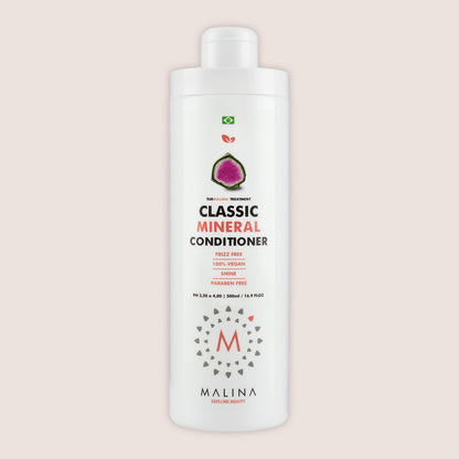 Front view of Malina Classic Mineral Conditioner bottle, highlighting frizz-free, 100% vegan, and paraben-free properties for shine and smoothness.